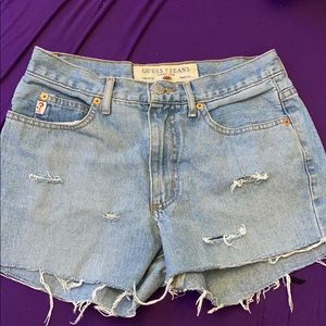 Guess low rise boot leg jean shorts.